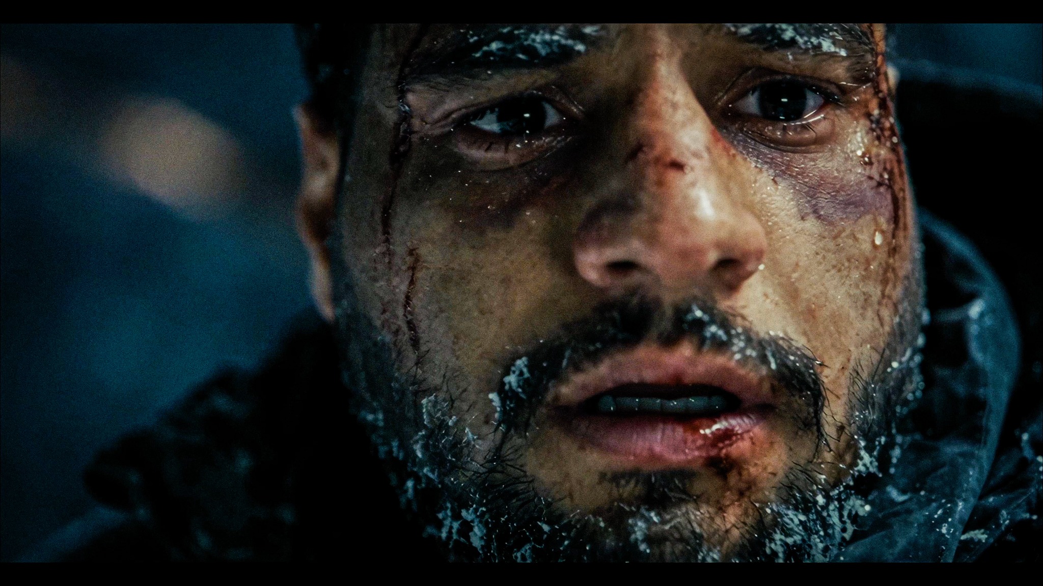 An ice-covered face in an original close-up from THE ECHO BELOW